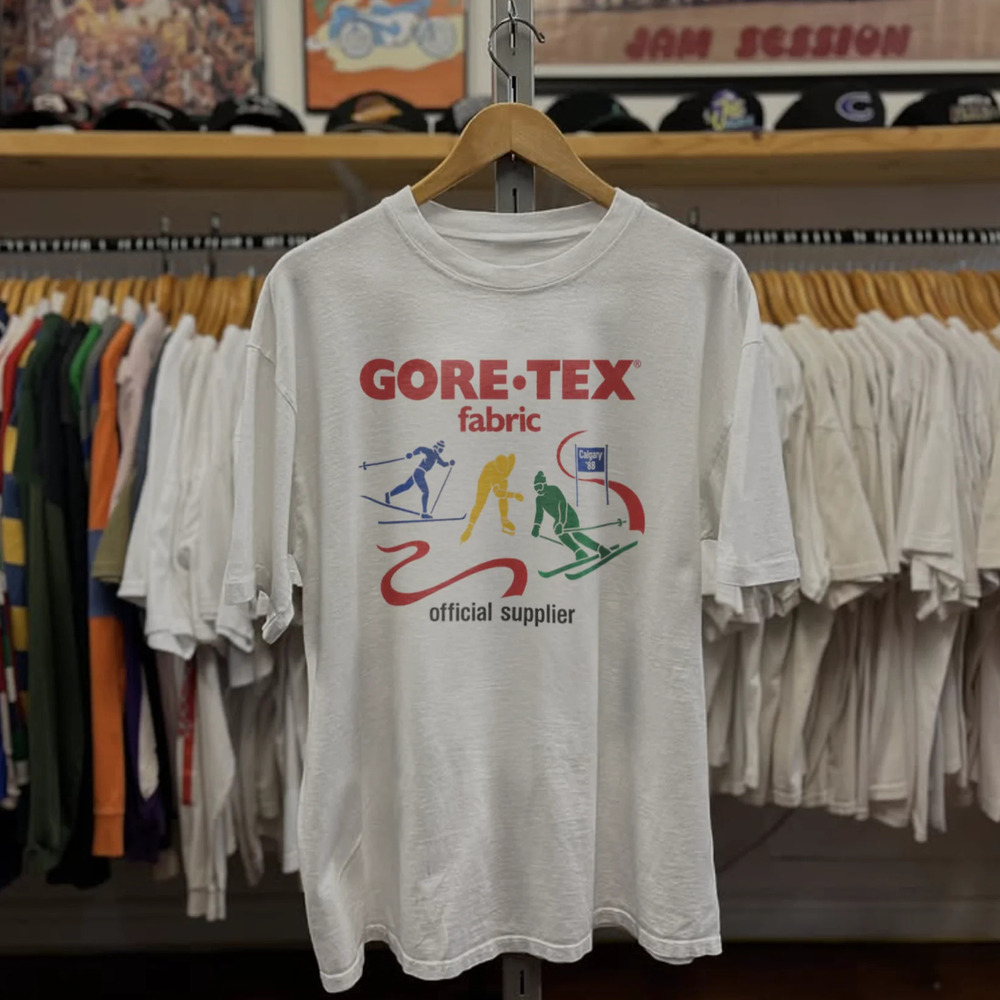 88 Calgary Goretex Official Supplier , White Tee